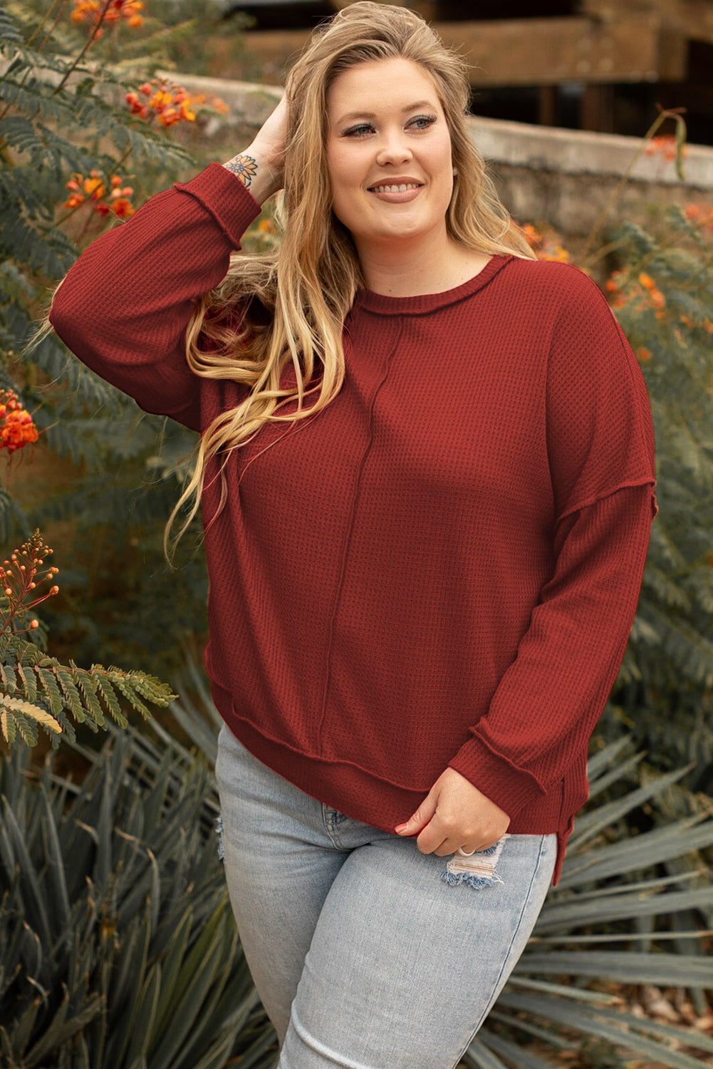 Chic plus size waffle knit top with exposed seam detail