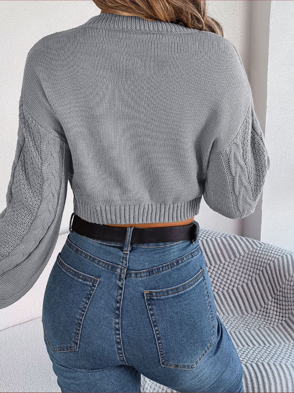 Cable-Knit Round Neck Cropped Sweater.