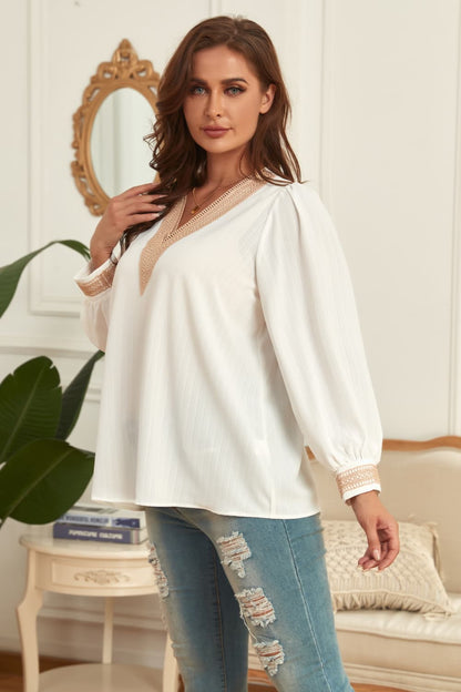 Melo Apparel Plus Size V-Neck Puff Sleeve Blouse.