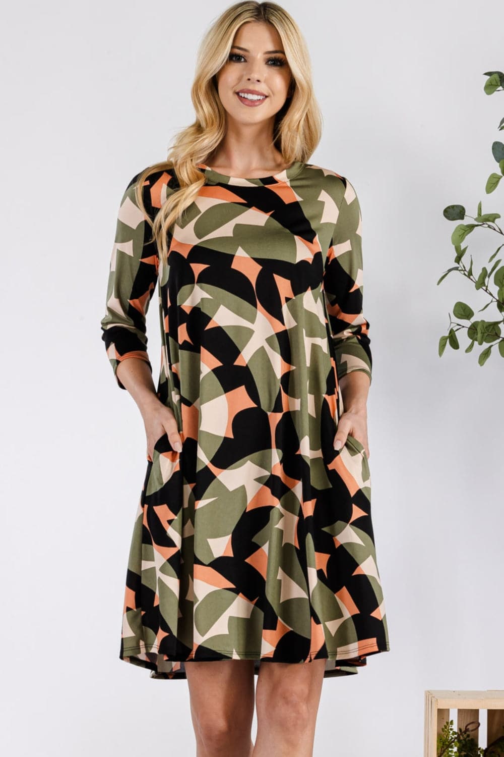 Celeste Full Size Geometric Round Neck Dress with Pockets.