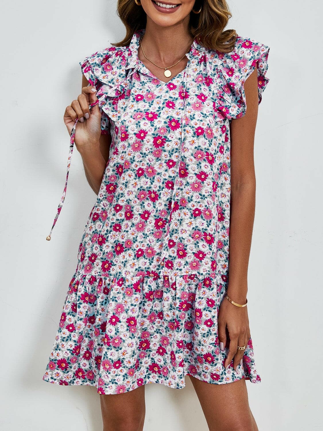 Tied Floral Cap Sleeve Mini Dress.