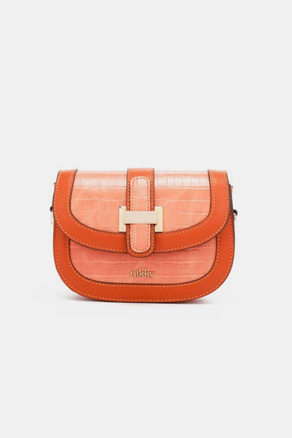 Sophisticated croc embossed crossbody bag by Nicole Lee USA