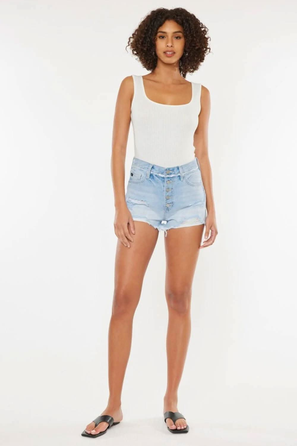 Edgy chic distressed button-fly denim shorts