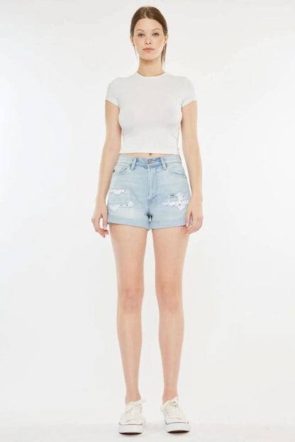 Vintage-inspired high rise repaired mom denim shorts