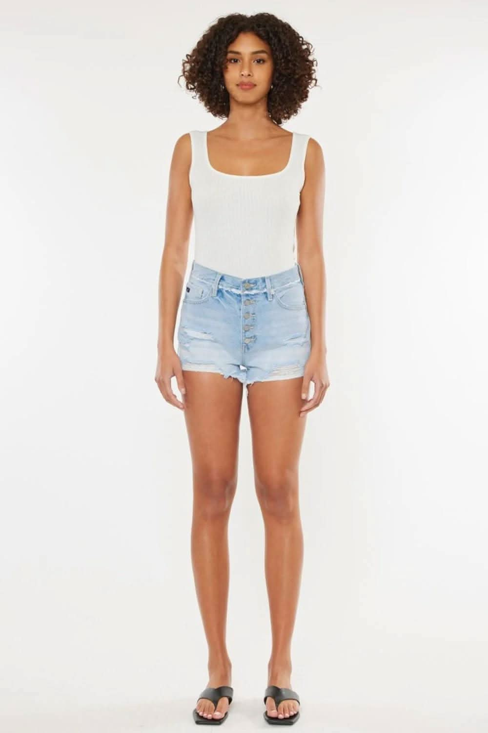 Edgy chic distressed button-fly denim shorts