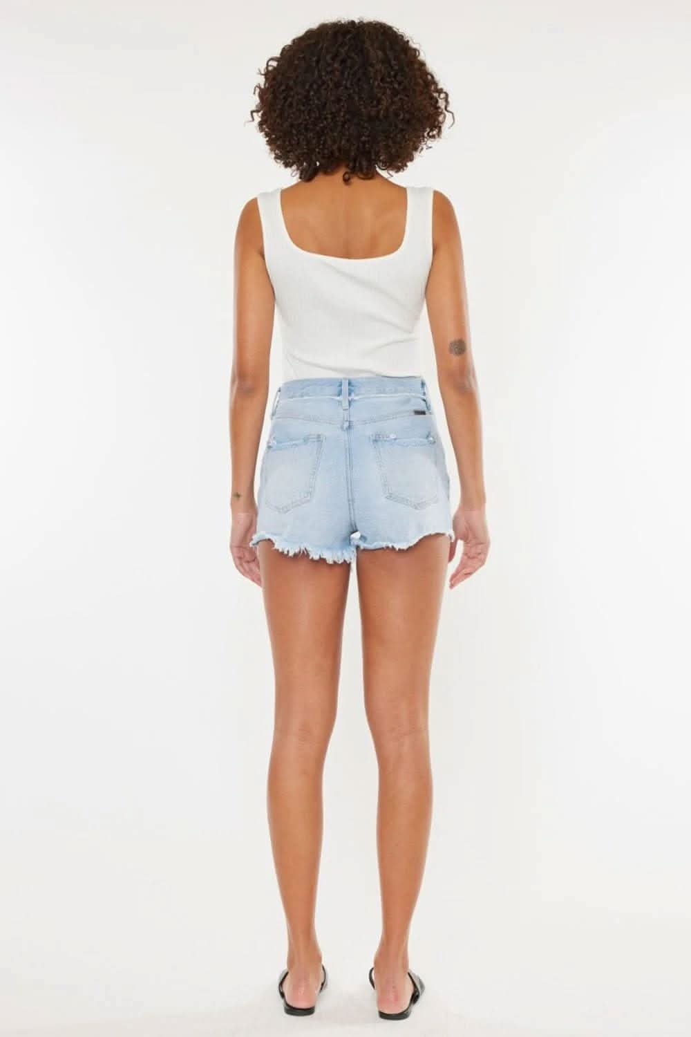 Edgy chic distressed button-fly denim shorts