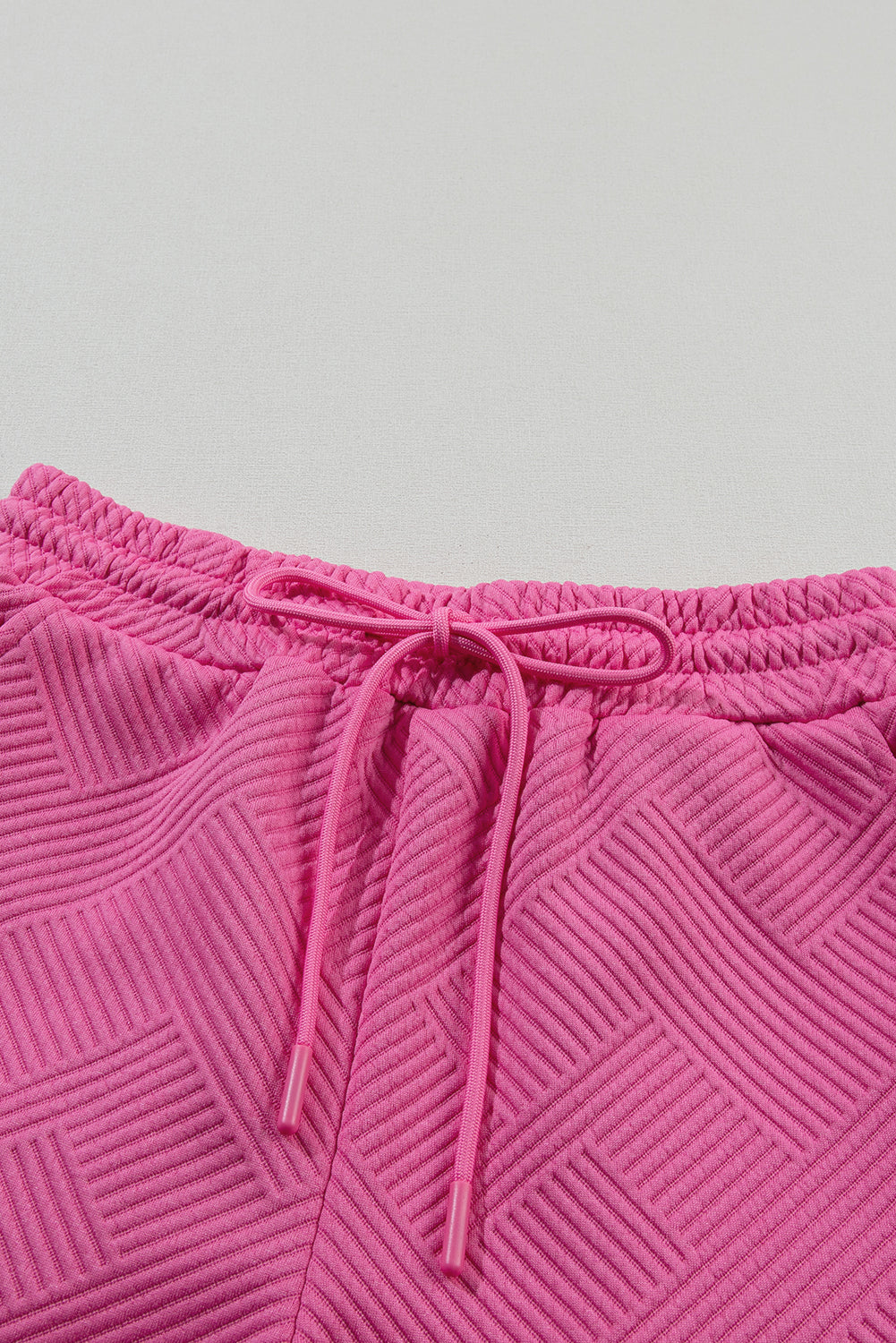 Strawberry pink textured drawstring shorts and top set