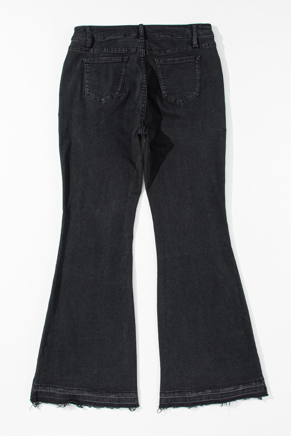 Chic black high-rise flared jeans with retro button front