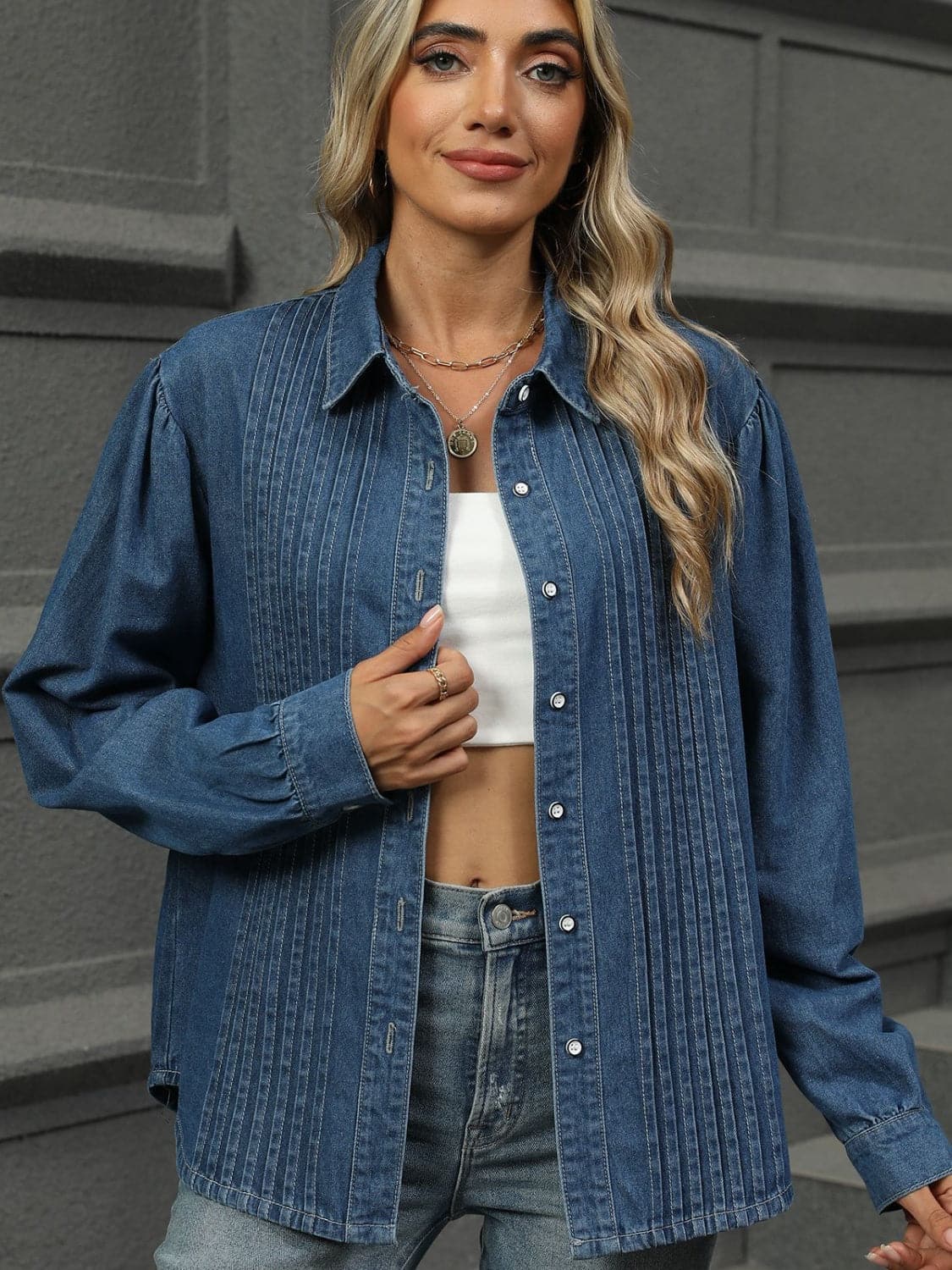 Classic button-down denim shirt with collar and long sleeves