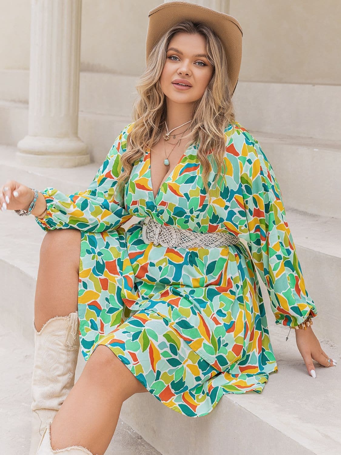 Plus Size Printed Surplice Long Sleeve Mini Dress.