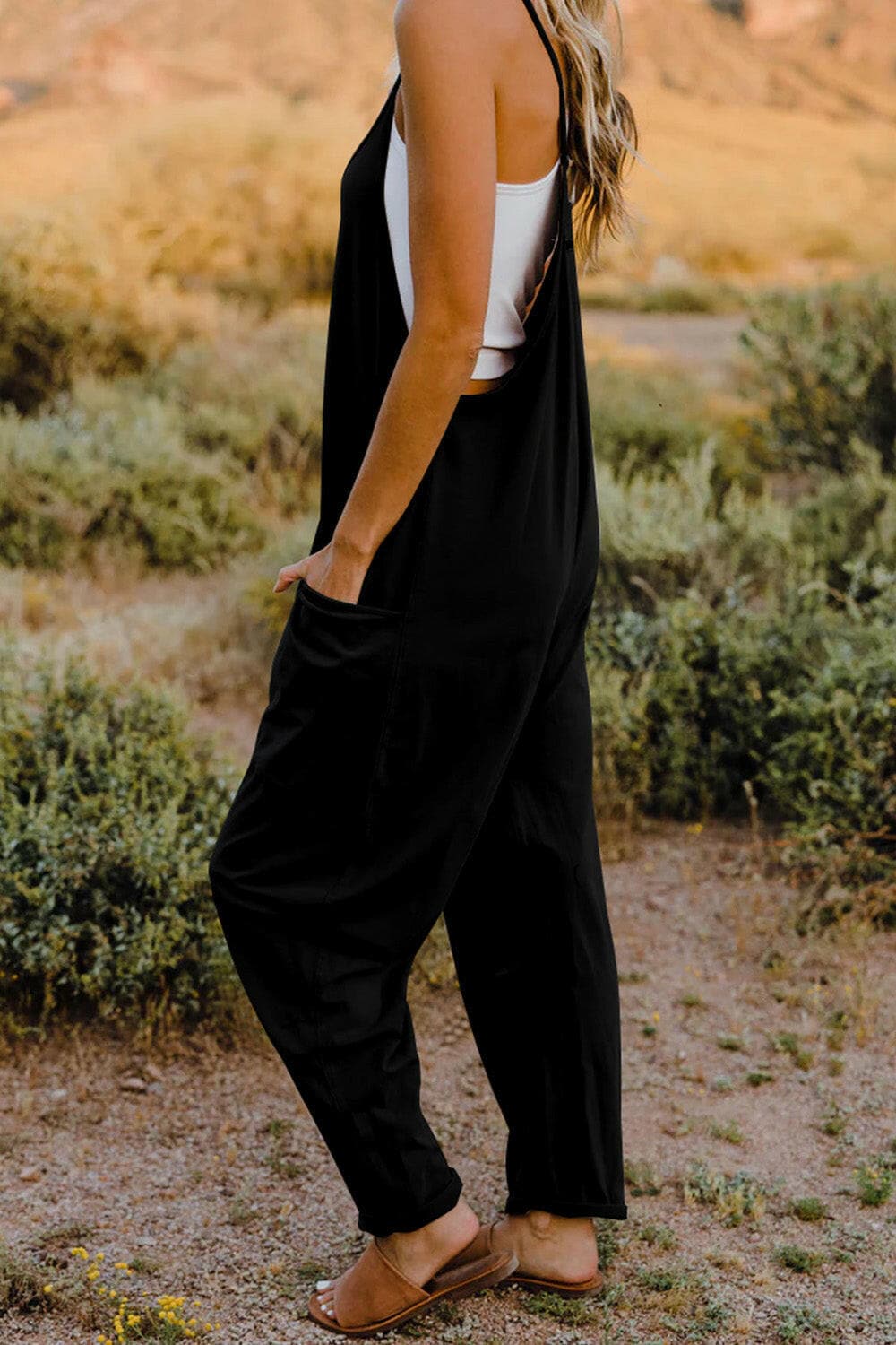 Double Take Full Size V-Neck Sleeveless Jumpsuit with PocketsUpgrade Your Style
 Introducing the Double Take Full Size V-Neck Sleeveless Jumpsuit with Pockets – where fashion meets functionality! This chic jumpsuit is designedLove Salve -Neck Sleeveless Jumpsuitusa