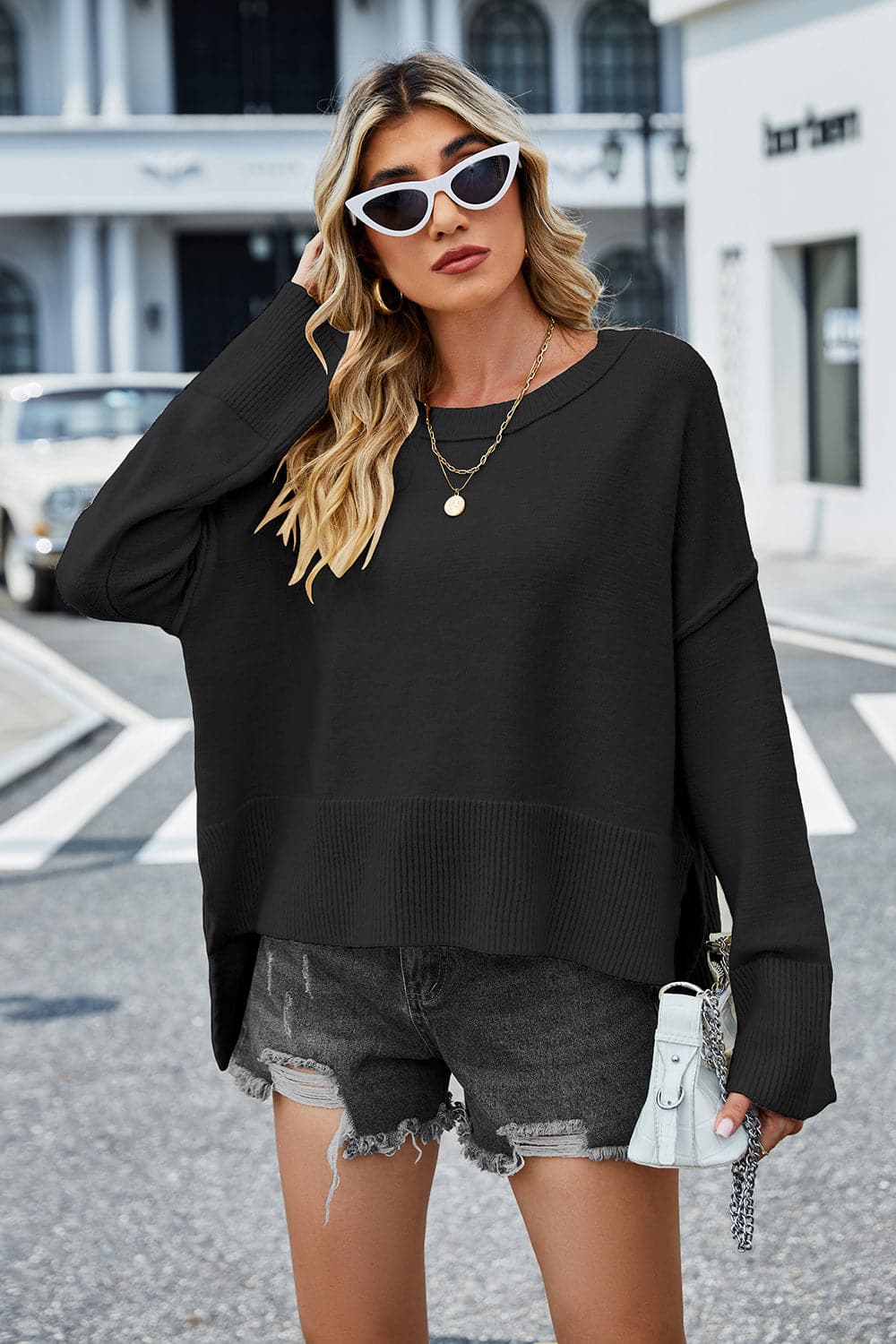 High-Low Slit Round Neck Long Sleeve Sweater.