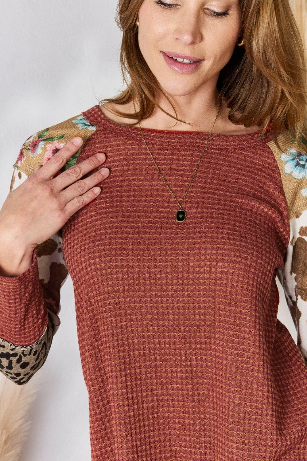 Hailey & Co Full Size Leopard Waffle-Knit Blouse.