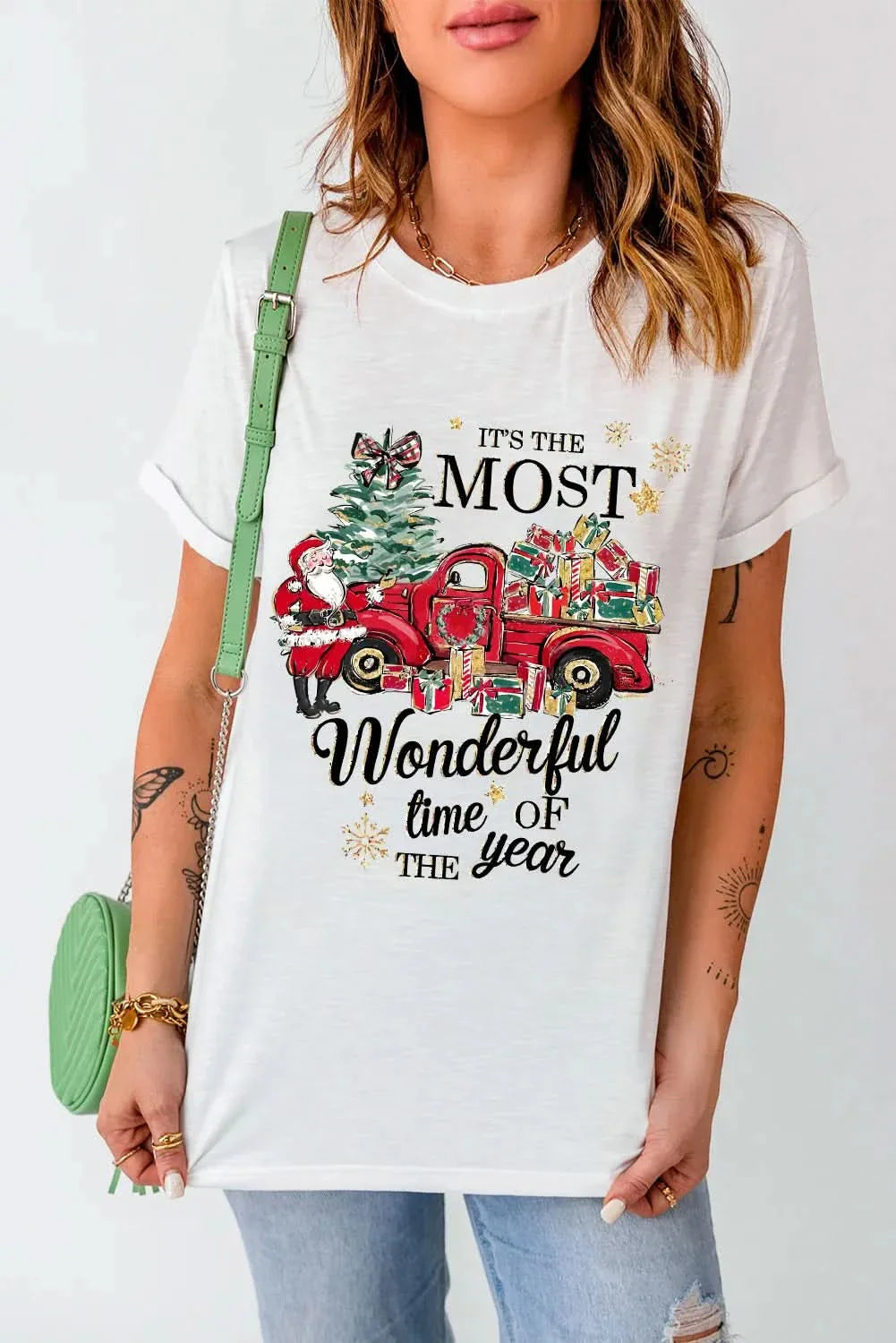 Women's white graphic round neck short sleeve T-shirt with festive print.