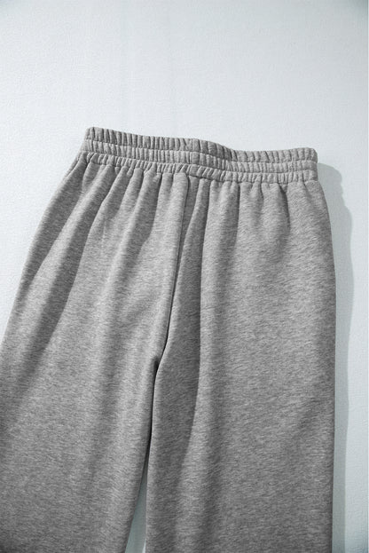 Light grey fleece pants with drawstring