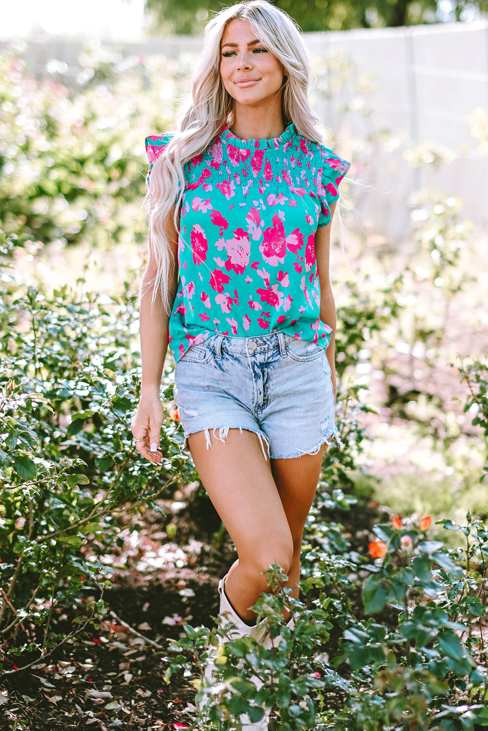 Floral green ruffled blouse with flutter sleeves