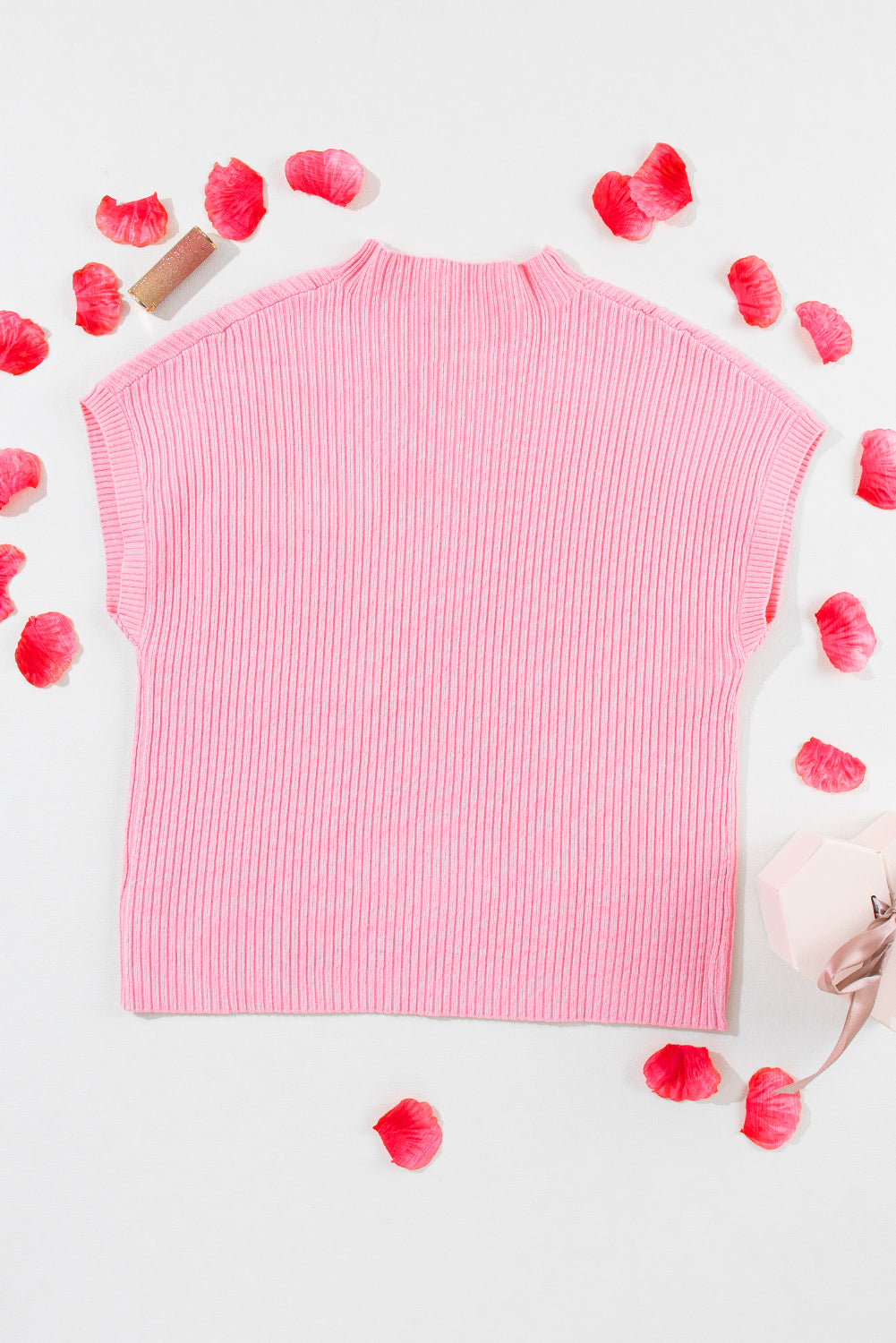 Cozy pink ribbed knit sweater with patch pocket and short sleeves