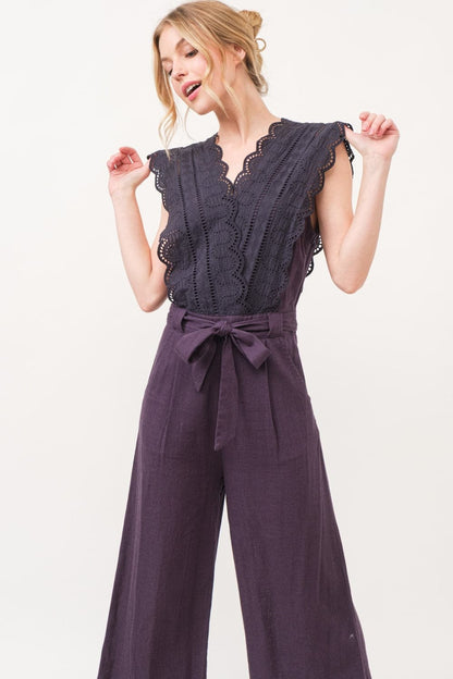 Elegant lace detail surplice jumpsuit with tie waist