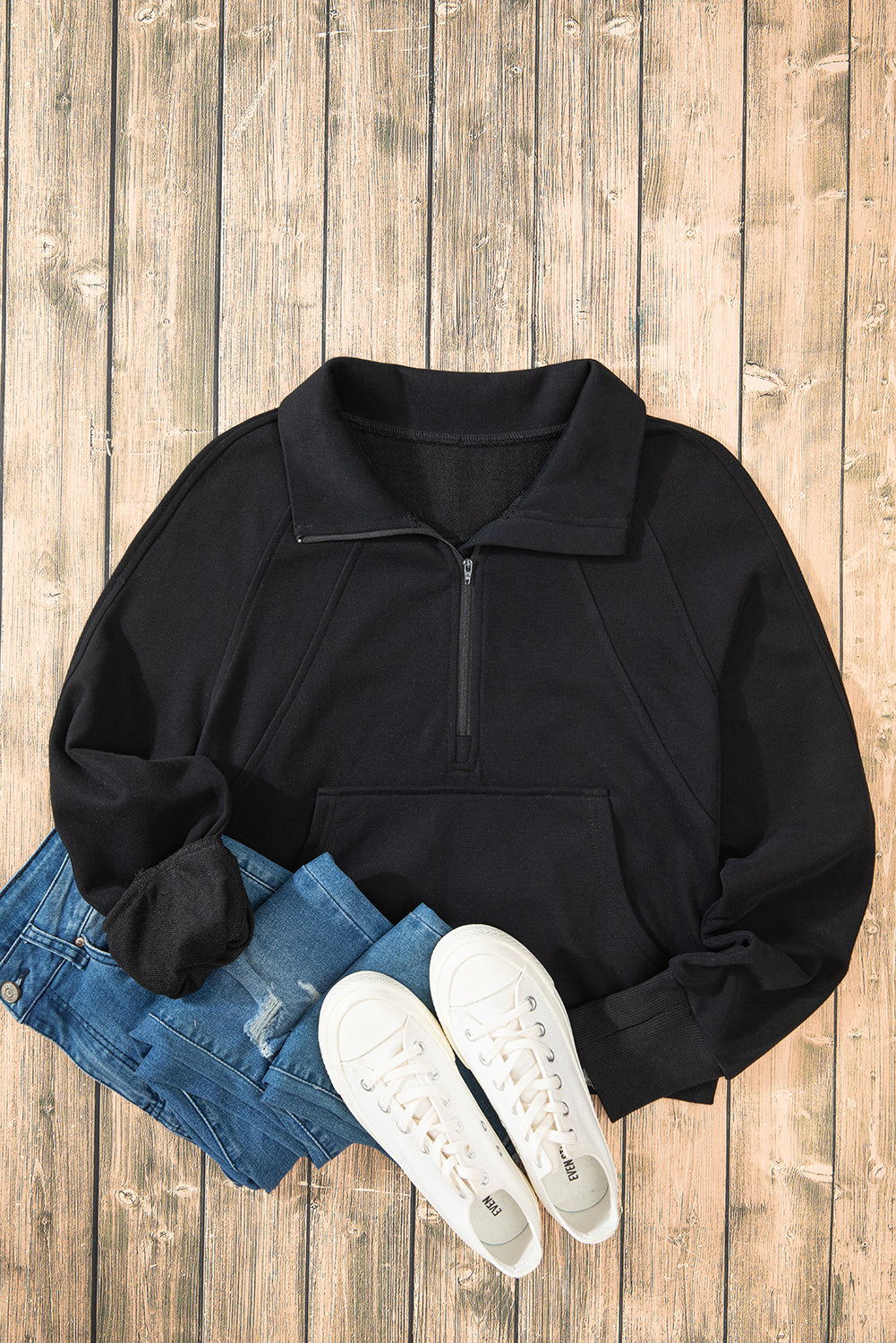 Chic black quarter zip sweatshirt with kangaroo pocket