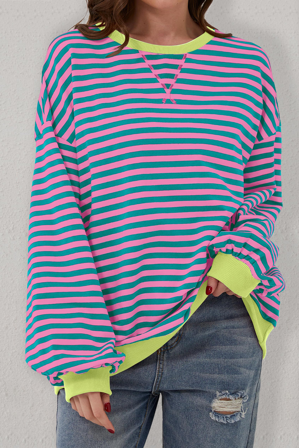 Trendy green striped oversized pullover with contrast detailing