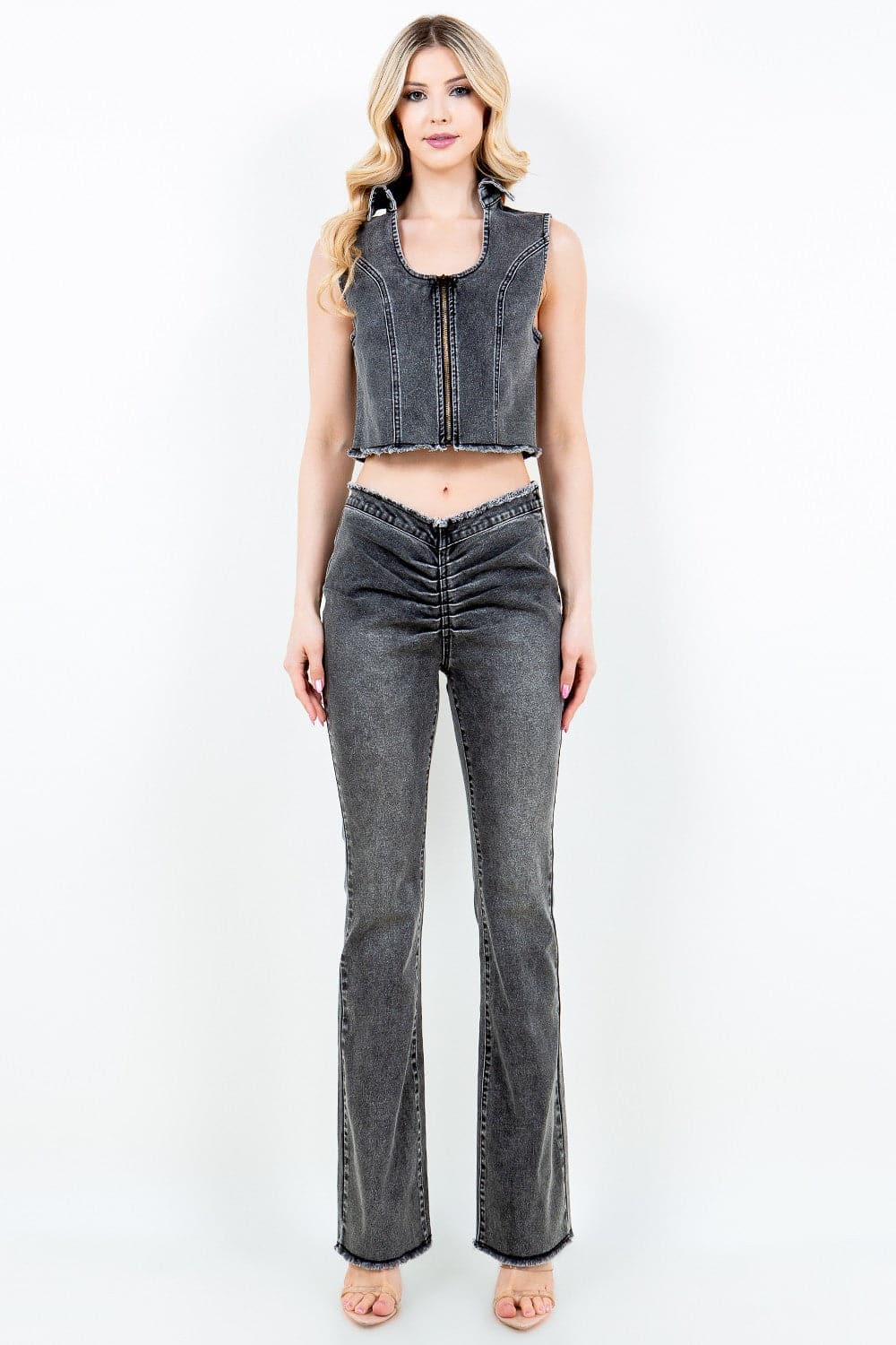 Trendy cropped denim vest with zipper front and raw hem