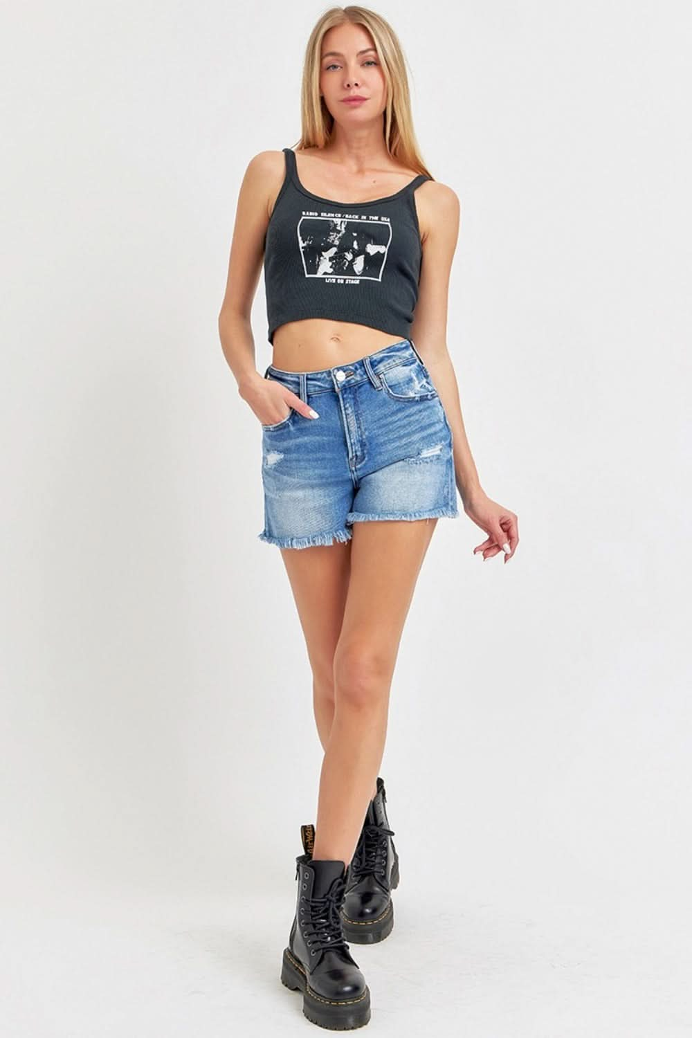 High rise distressed denim shorts with raw hem detail