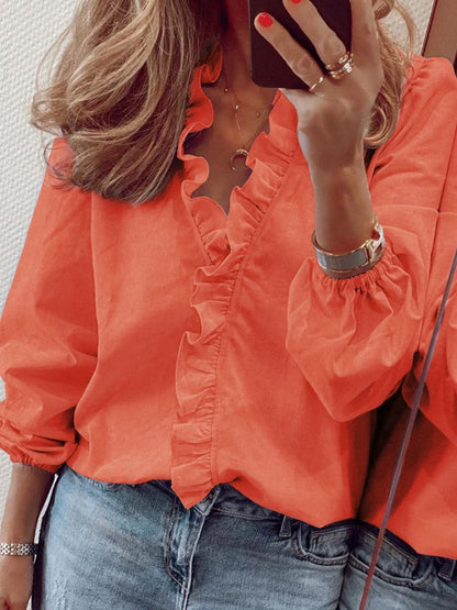 Chic ruffled v-neck blouse with long sleeves