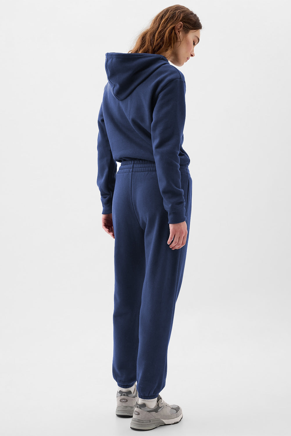 Navy blue fleece-lined joggers with adjustable drawstring waist