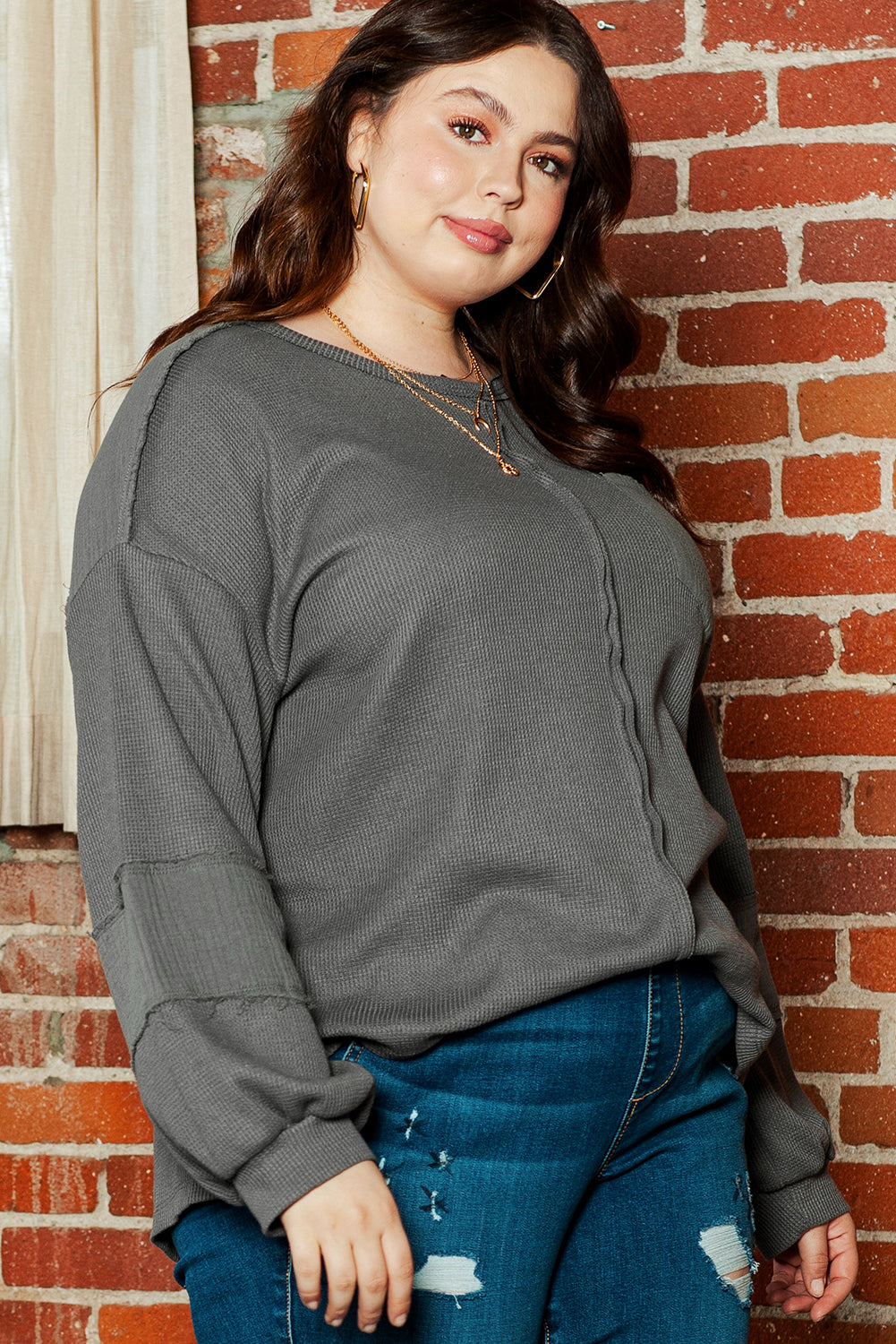 Chic dark grey plus size crinkle patchwork top with exposed seams