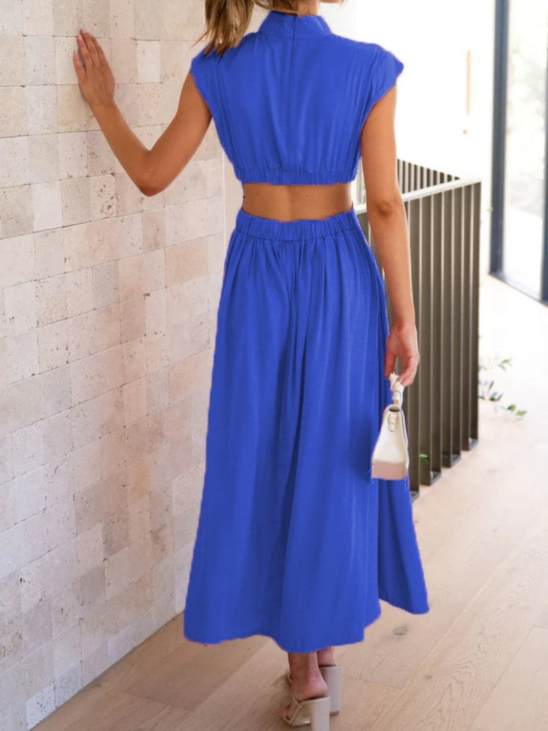 Cutout Mock Neck Sleeveless Ruched Dress.