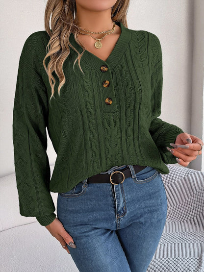 Chic cable-knit v-neck sweater with buttoned details