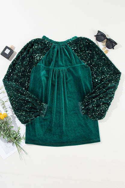 Glamorous velvet top with sequin patchwork sleeves