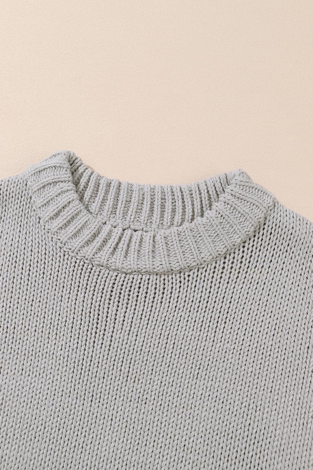 Round Neck Long Sleeve Sweater.