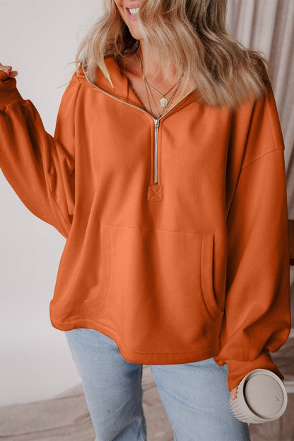 Pocketed Half Zip Dropped Shoulder Hoodie.