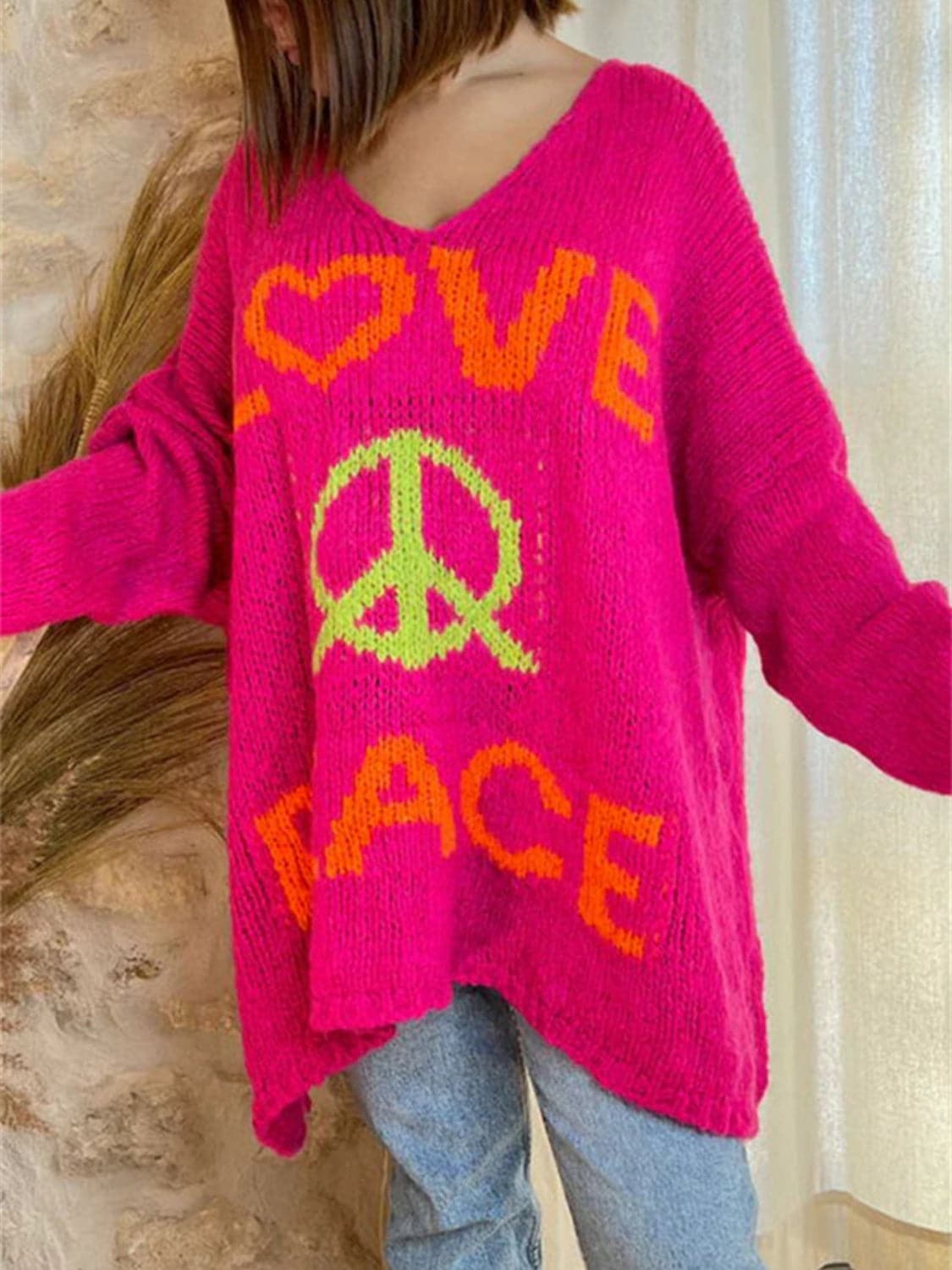 Peace Graphic V-Neck Long Sleeve Sweater.