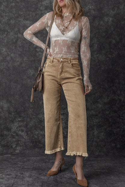 Chic light beige high-rise cropped wide-leg jeans with frayed hem