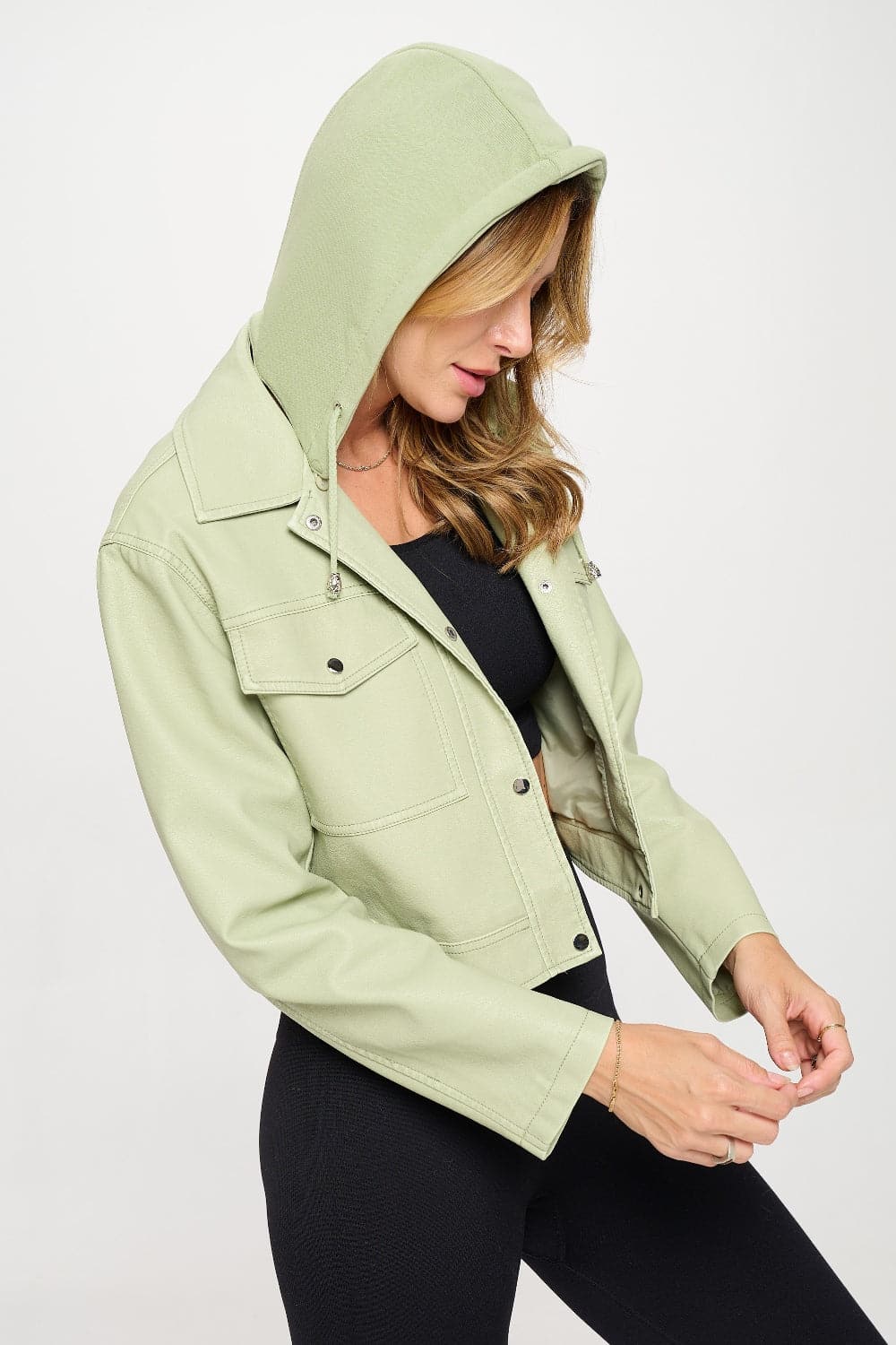 Coalition LA Snap Down Cropped Hooded JacketThis snap down cropped hooded jacket is a trendy and versatile piece for your wardrobe. The snap closures add a touch of edginess to the jacket. With a cropped lengtLove Salve Coalition LA SnapOuterwear