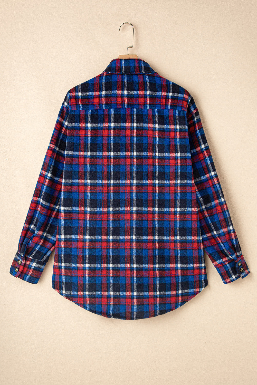 Navy plaid button-up shacket with flap pockets