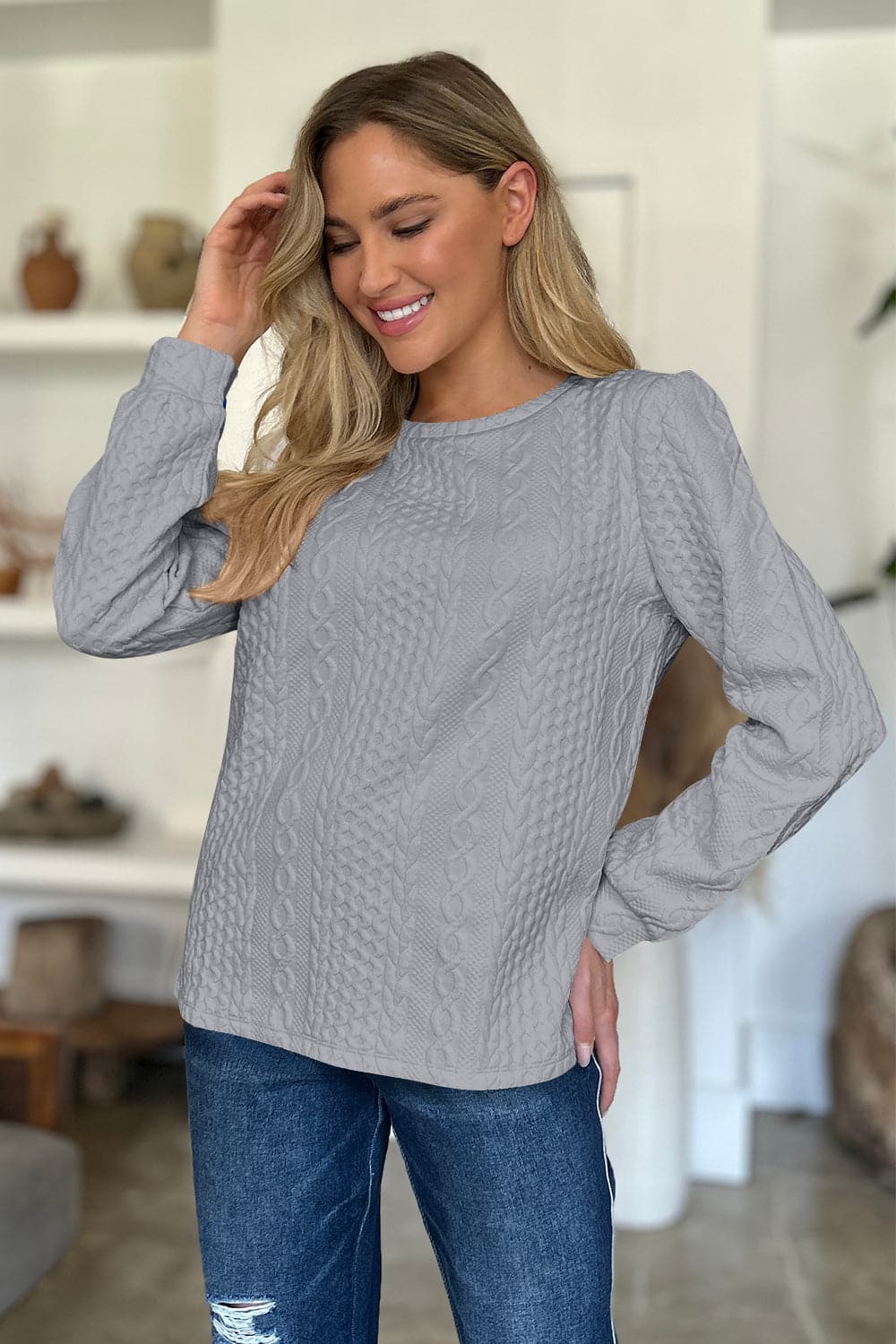 Textured Round Neck Long Sleeve Sweatshirt.