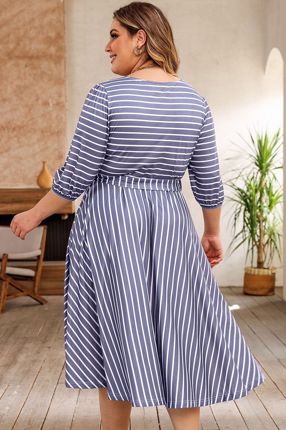 Chic gray striped plus size dress with tie waist and 3/4 sleeves