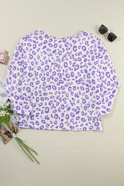 Cozy purple leopard print top with boat neck and drop shoulders