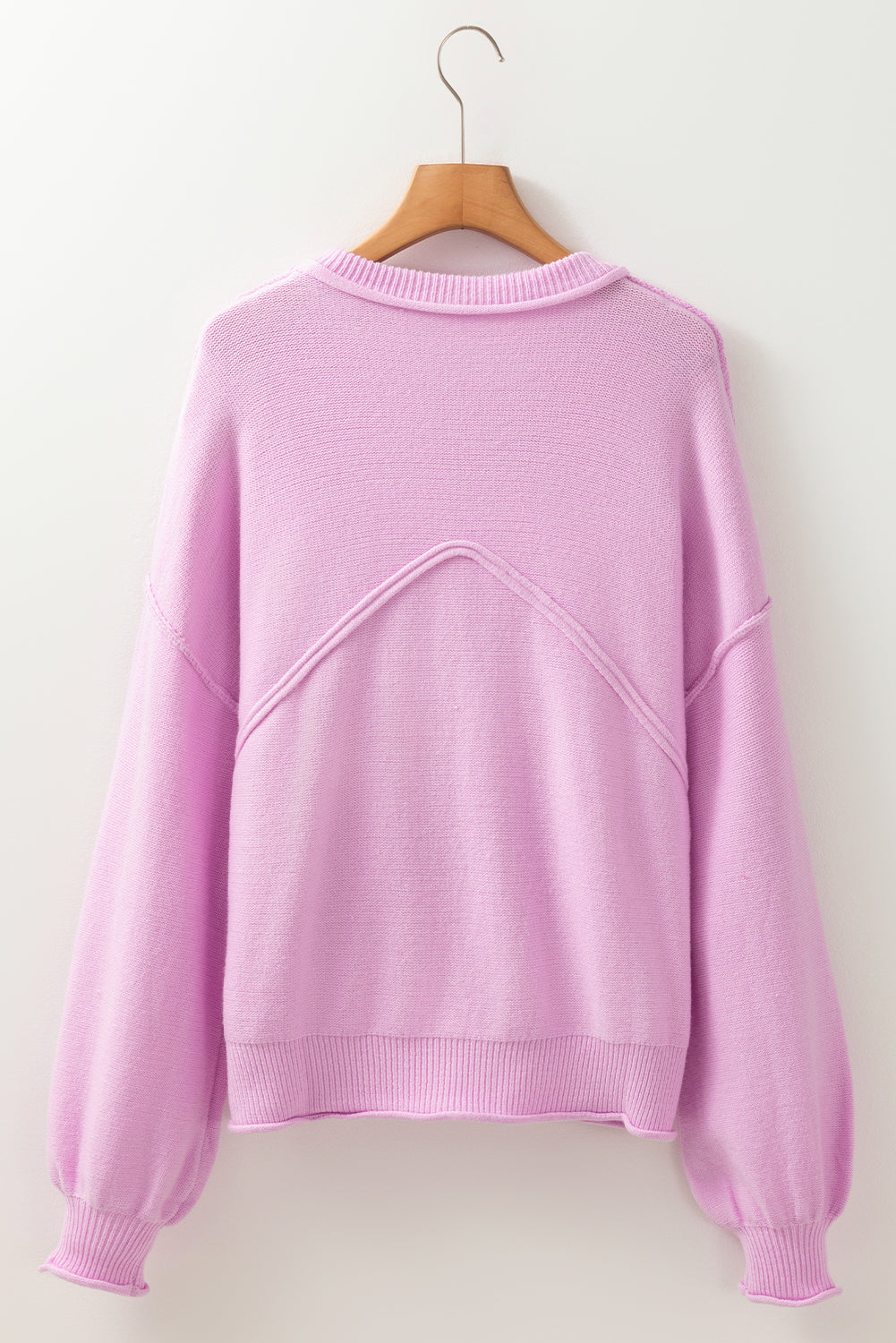 Cozy Pink Drop Shoulder Sweater with Raw Edge and Ribbed Details