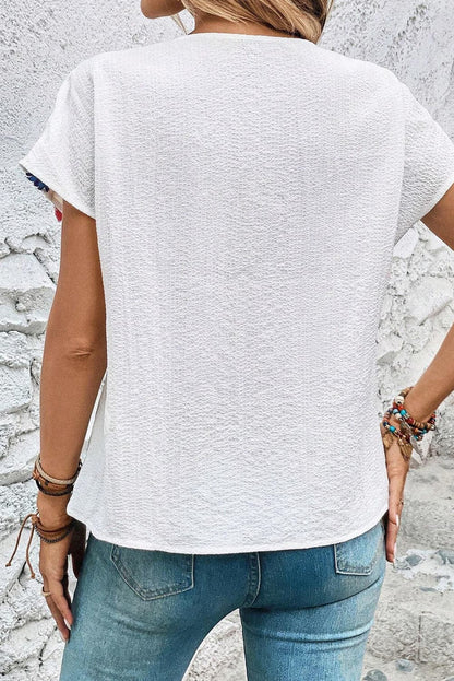 Tassel Tie Neck Short Sleeve Blouse.