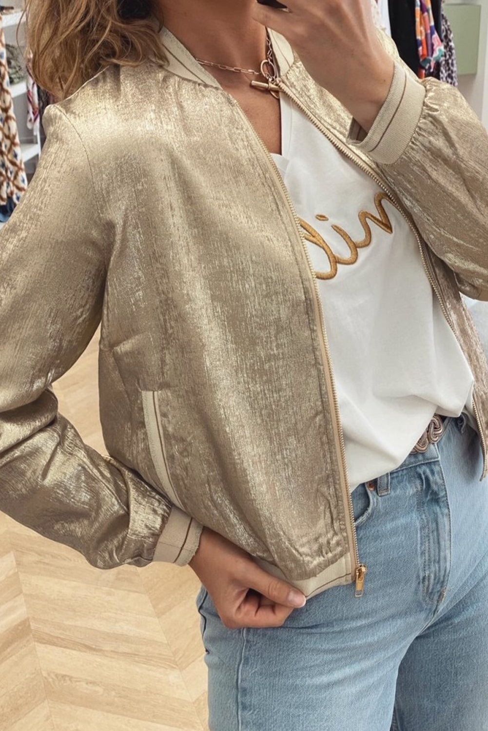 Shimmering pale khaki metallic baseball jacket with zip closure