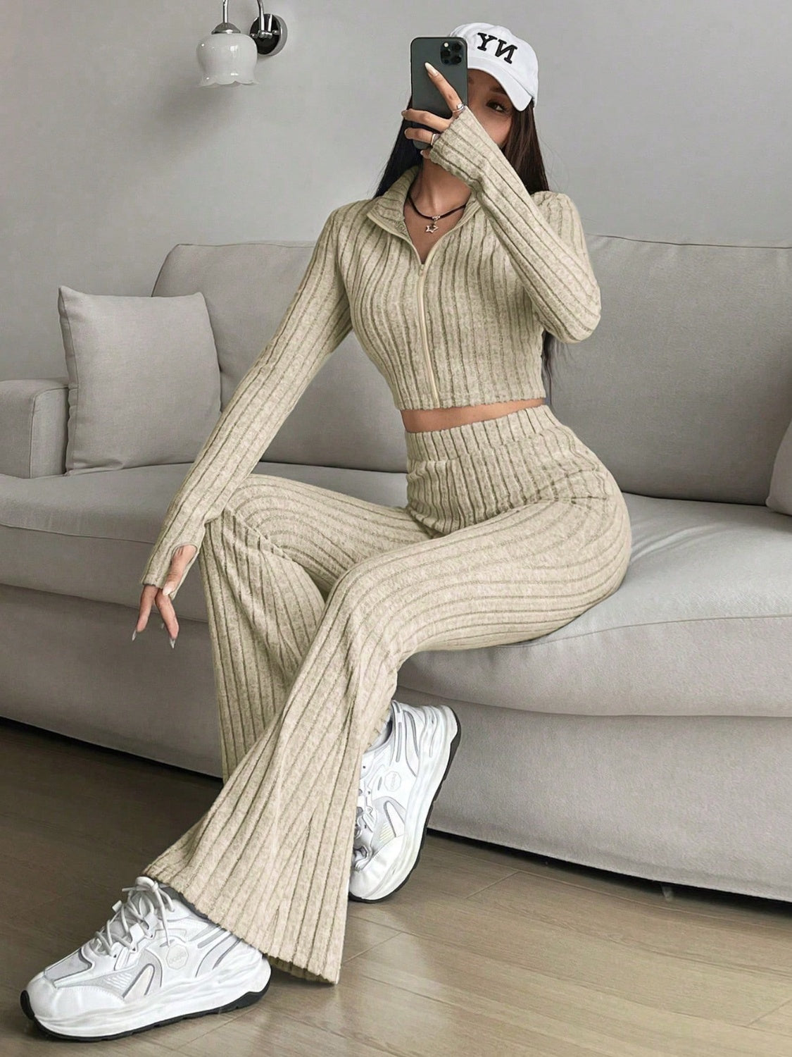 Zip Up Long Sleeve Top and Pants SetFeatures: Basic style
Number of pieces: Two-piece
Stretch: Slightly stretchy
Material composition: 95% polyester, 5% elastane
Care instructions: Machine wash cold. TLove Salve Long Sleeve TopTwo-Piece Sets