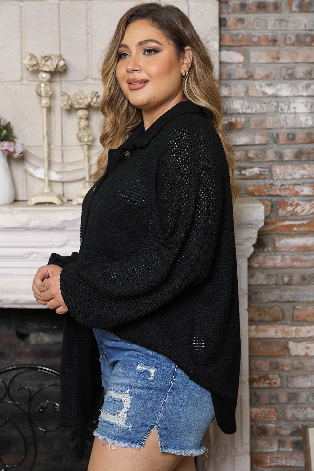 Chic black plus size pocketed waffle knit top