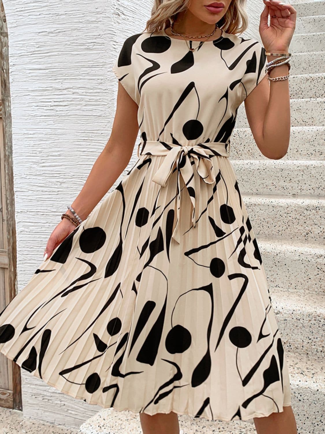 Tied Pleated Printed Cap Sleeve Dress.