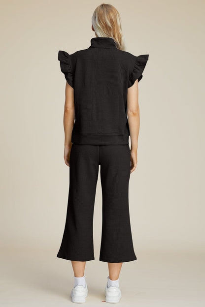 Double Take Full Size Texture Ruffle Short Sleeve Top and Wide Leg Pants Set.