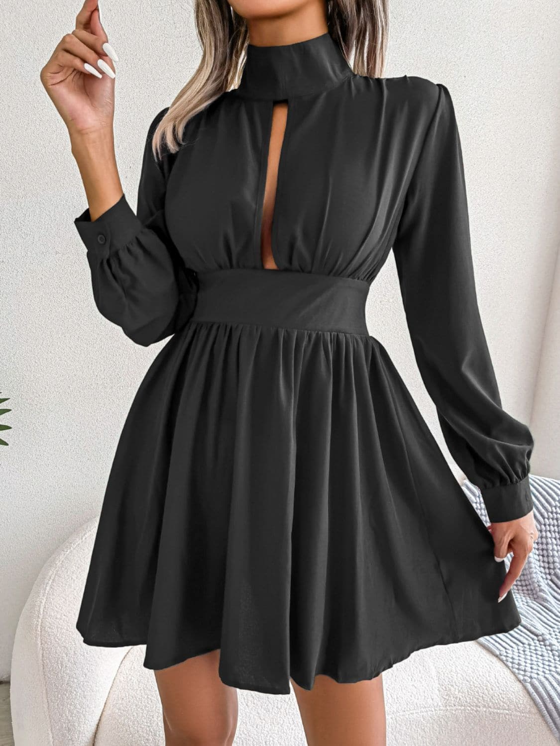 Cutout Turtleneck A-Line Mini Dress.