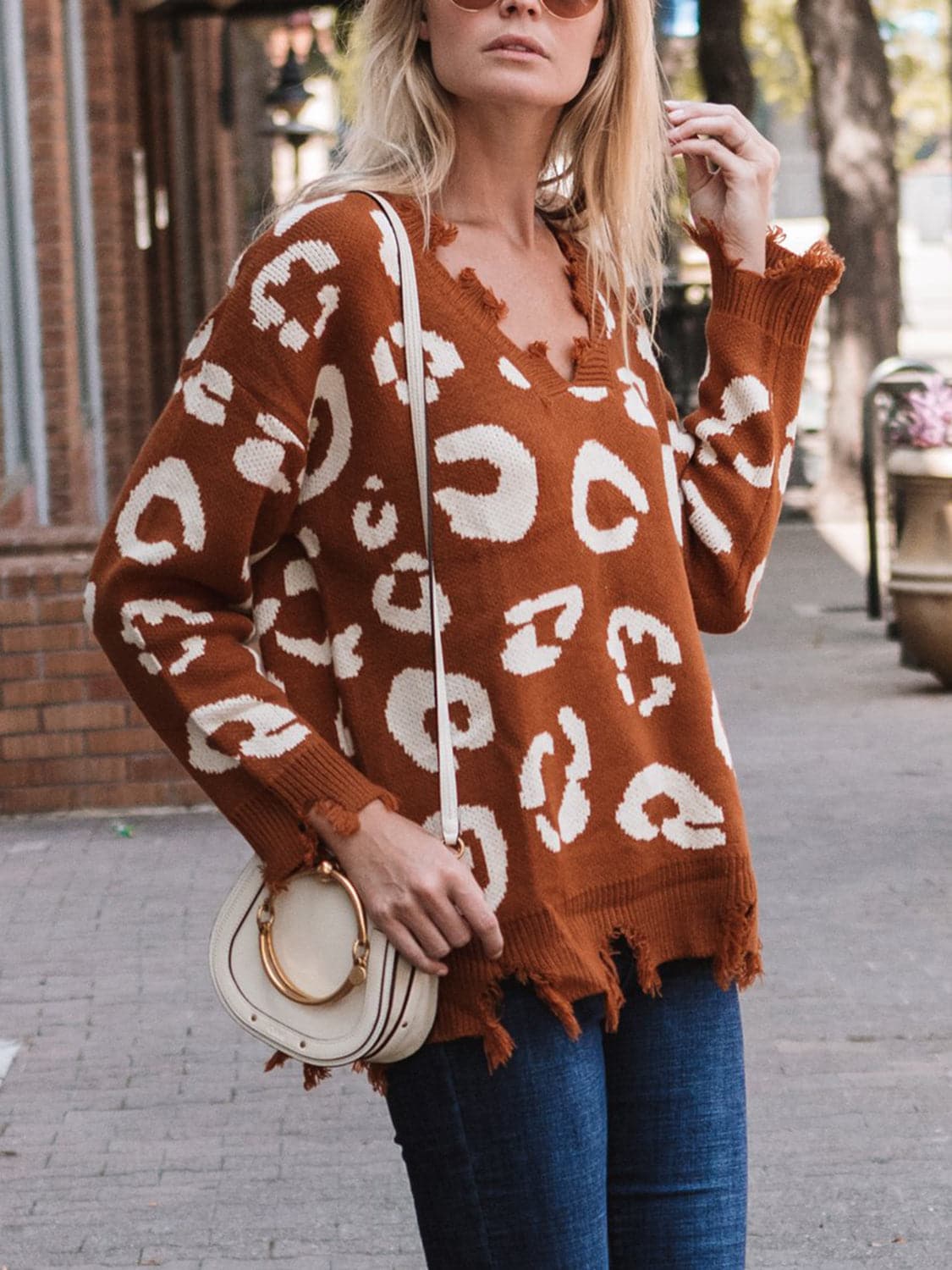 Leopard Frayed Hem Long Sleeve Sweater.